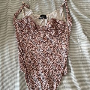 Never worn urban outfitters out from under cheetah print body suit with cups